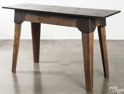 Industrial style wood and pressboard work table