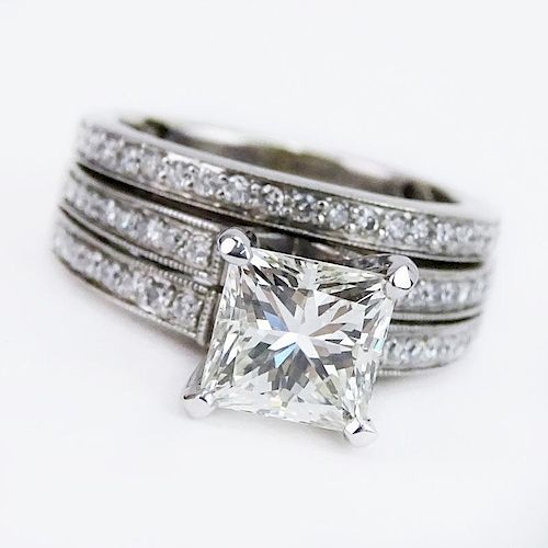 EGL Certified 2.01 Carat Princess Cut Diamond and 14 Karat White Gold Engagement Ring accented throughout with approx. .60 Ca