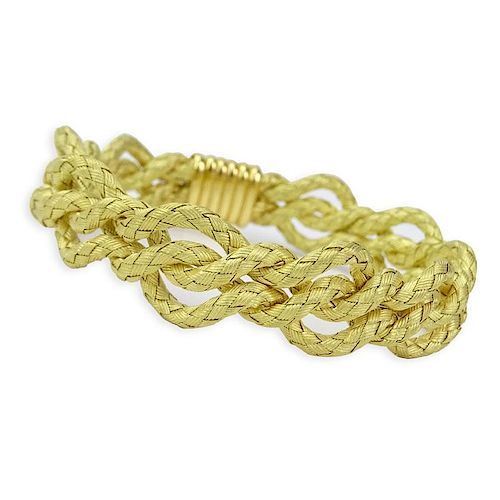 18 Karat Yellow Gold Four Strand Woven Rope Bracelet.