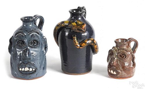 Two Mary & Stanley Ferguson stoneware face jugs