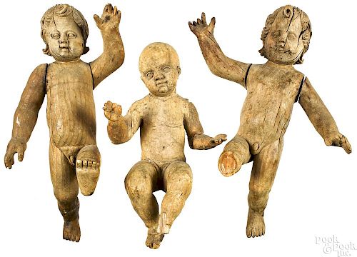 Three Continental carved cherubs