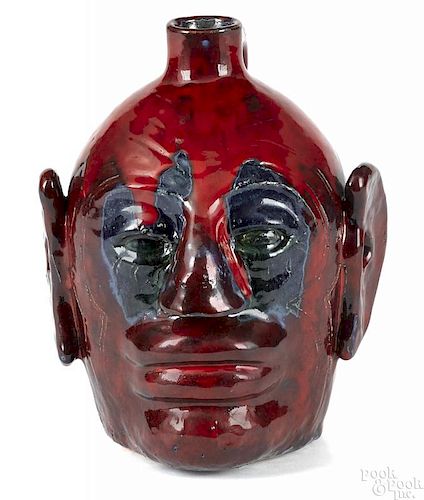 Edwin Meaders red glaze stoneware face jug
