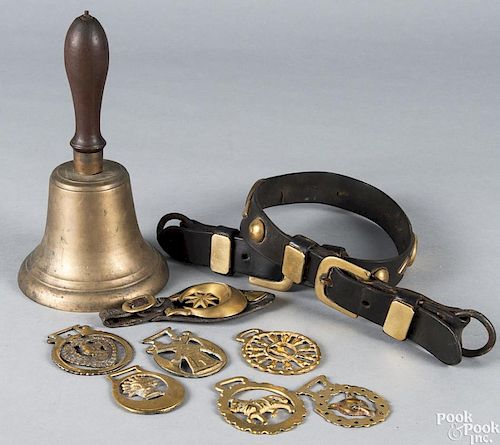 Horse tack, together with a brass bell.