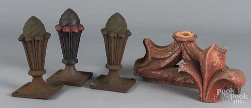 Three cast iron cone shaped architectural elements