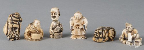 Six Japanese Meiji period carved ivory netsuke.