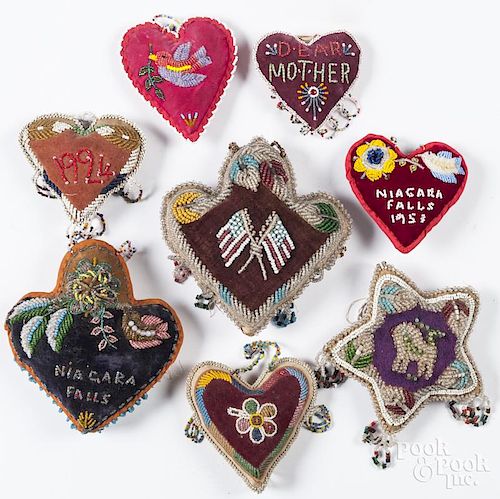 Eight Native American beadwork pincushions