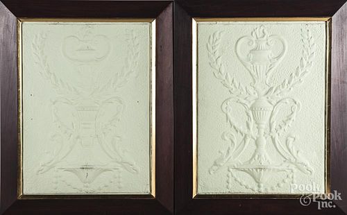 Pair of painted embossed tin panels, 24'' x 18''.
