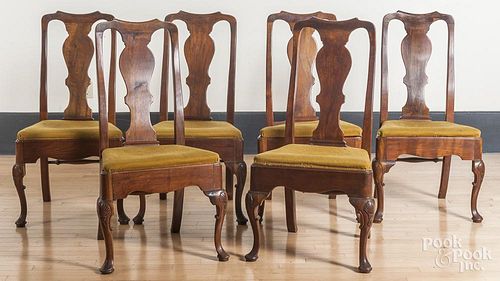 Set of six Queen Anne style walnut dining chairs.