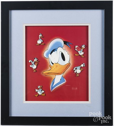 Two Walt Disney Donald Duck pin sets