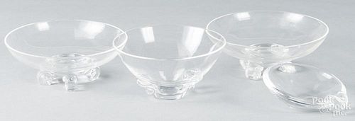 Four Steuben crystal bowls.
