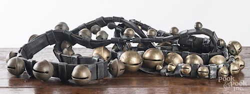 Two strands of brass sleigh bells, late 19th c.