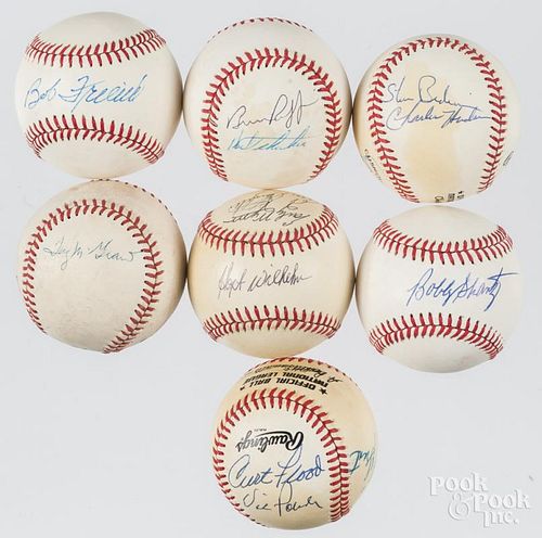 Seven signed baseballs