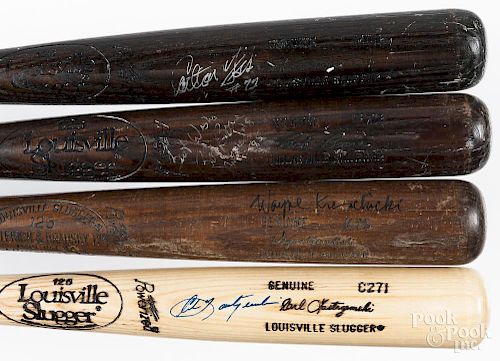 Four autographed baseball bats