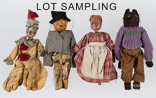 Ten carved and painted wood marionettes