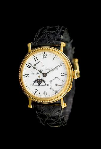 An 18 Karat Yellow Gold Ref. 5015 Wristwatch, Patek Philippe,