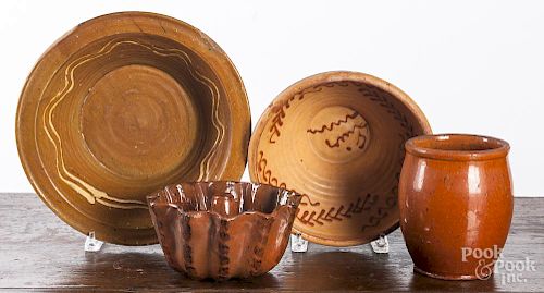 Two slip decorated redware bowls