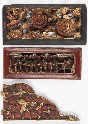 Three Chinese carved and painted wood plaques.