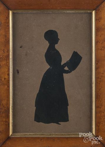 Cutout silhouette of a woman with a book, 19th c.