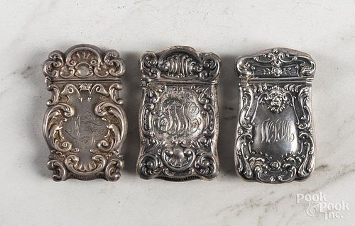 Three sterling silver match vesta safes