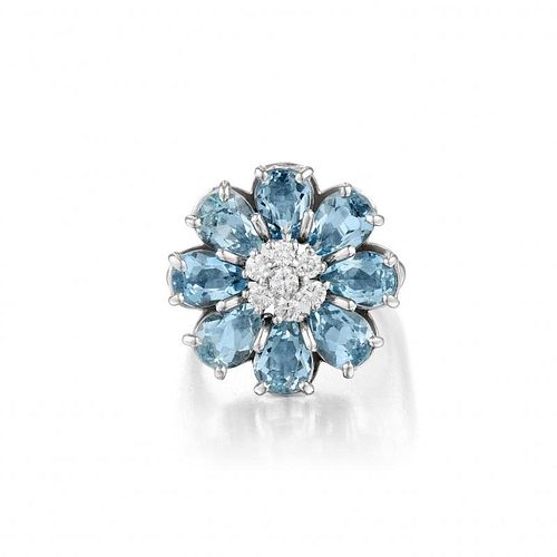 An Aquamarine and Diamond Flower Ring