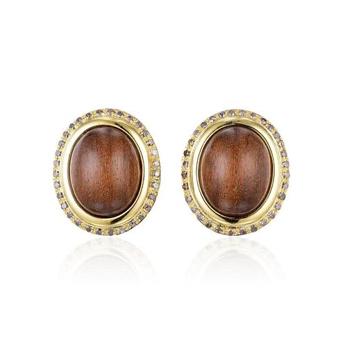 A Pair of Wood and Diamond Earrings