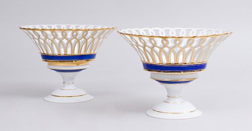 PAIR OF FRENCH PORCELAIN STEMMED COMPOTES WITH PIERCED BOWLS AND COBALT BANDS