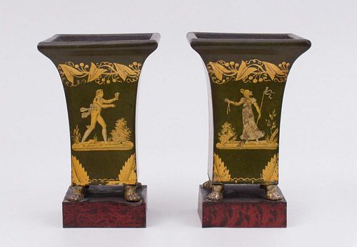 PAIR OF FRENCH GREEN PAINTED AND PARCEL-GILT TÔLE JARDINIÈRES, ON MARBELIZED BASES