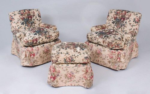 PAIR OF TEA STAINED LINEN CHINTZ UPHOLSTERED CLUB CHAIRS AND MATCHING OTTOMAN