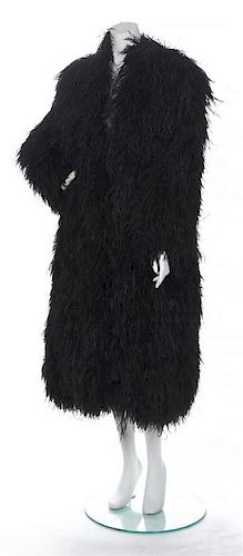 An Yves Saint Laurent Black Ostrich Coat, Size 38.