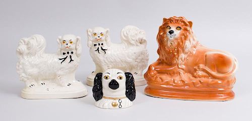 PAIR OF STAFFORDSHIRE DOGS AND A LION