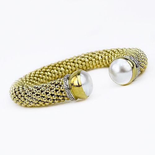 Italian 14 Karat Yellow Gold Flexible Cuff Bangle with Mabe Pearl and Diamond Accents.