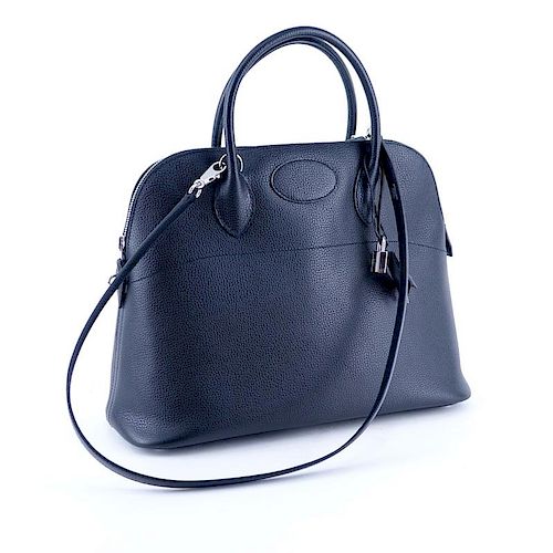 Hermès Black Ardennes Bolide 37 Bag. Palladium hardware, clochette, zipper closure, optional shoulder strap, slot pocket on 