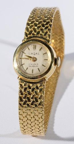 Cazal 18 karat gold ladies wrist watch with 18 karat gold band. 7in., total weight 29.5 grams