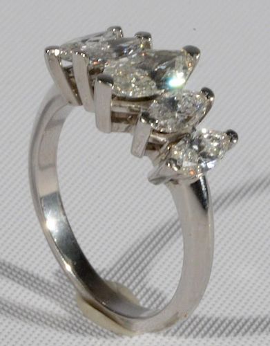 14 karat white gold ladies ring set with five marquise diamonds center being approximately .30-.35 cts., flanked by two marqu