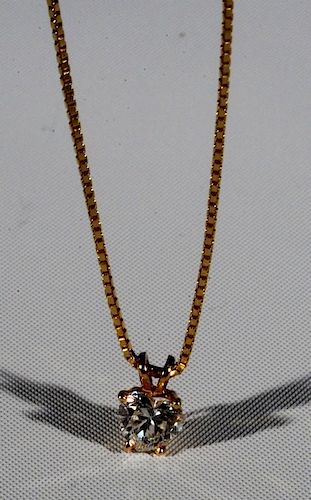 14 karat yellow gold chain and pendant mounted with heart shaped brilliant cut diamond, F-G Color