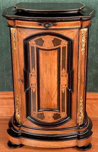 Renaissance Revival rosewood and ebonized cabinet with gilt metal mounts and birdseye maple interior. ht. 35in., top: 12" x 2