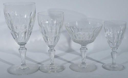 Set of forty-seven Baccarat "Auteuil" crystal stemmed glass to include 12 red: 7 1/2in., 12 white: 5in., 11 champaign: 6 3/8i