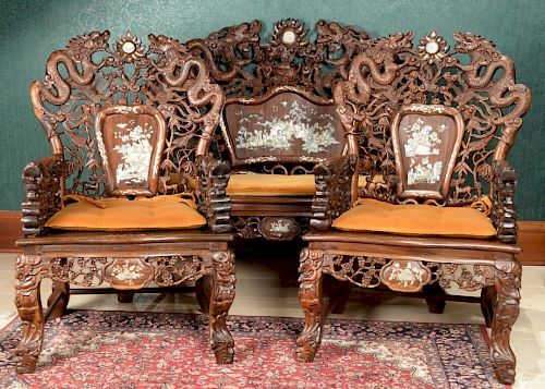 Five piece set, Chinese carved settee with mother of pearl inlaid back panel with dragon hand rests along with four matching