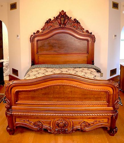 Three piece walnut Victorian bedroom set having carved armoire with full mirror door over drawer, a three drawer chest with r
