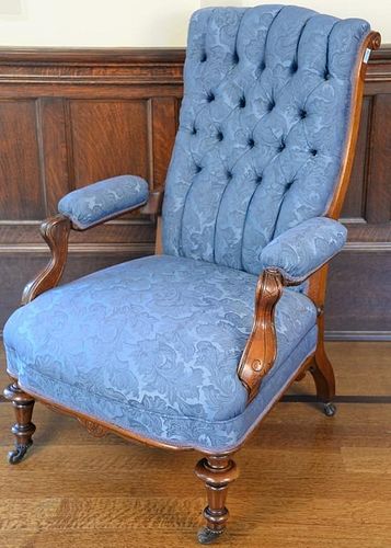 Victorian walnut reclining gentlemans chair with custom tufted upholstery. ht. 39in. Provenance: Property from the Estate of