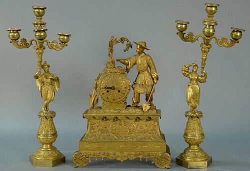 Bronze three piece clock set, clock mounted with Chinese man with hat and candelabra mounted with Chinese man and woman (woma
