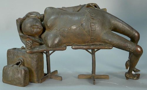 Large bronze of a woman sleeping on bench, waiting at the airport, initialed on seat of chair: CE?, 20th century