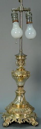 Continental silver lamp with four lion faces set on base with scrolled feet, probably was candelabra originally, marked .800