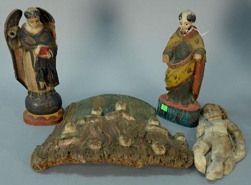 Four piece lot to include four carved figures, two are paint decorated. ht. 11 1/2in. to 13in.
