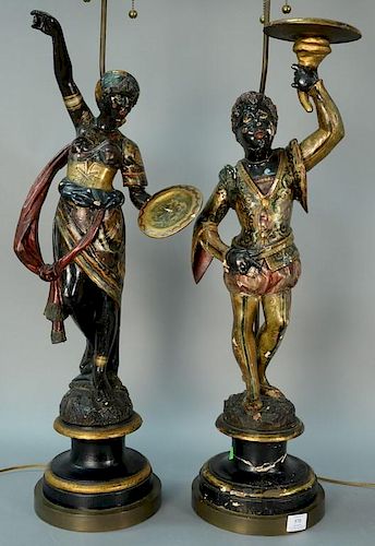 Pair of Venetian carved blackamoor figures holding small argente trays, polychromed and parcel gilt decorated wearing Orienta
