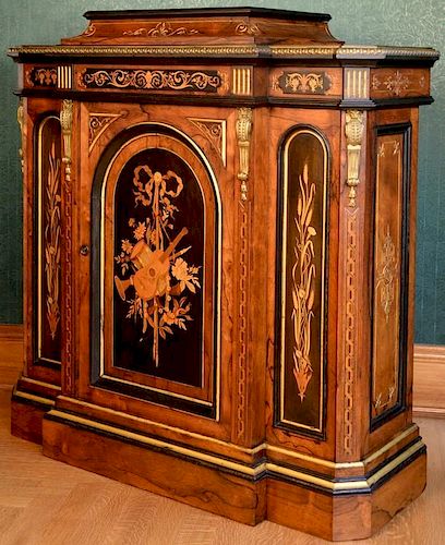 Renaissance Revival rosewood side cabinet having bronze mounts and various wood inlaid center door with birdseye maple interi