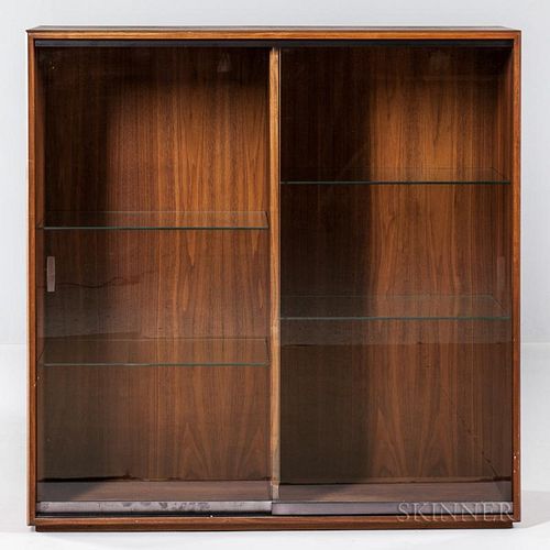 Jens Risom Cabinet  Teak and glassUnited States, mid 20th centuryRectangular form with glass doors interior fitted with four 