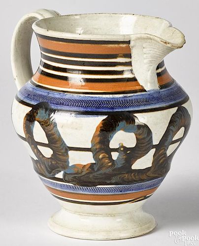 Mocha pitcher with earthworm decoration