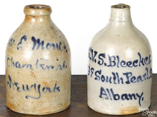Two New York stoneware advertising jugs, 19th c.