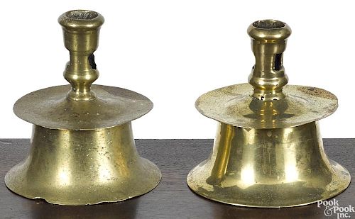 Two brass capstan candlesticks, 17th c.